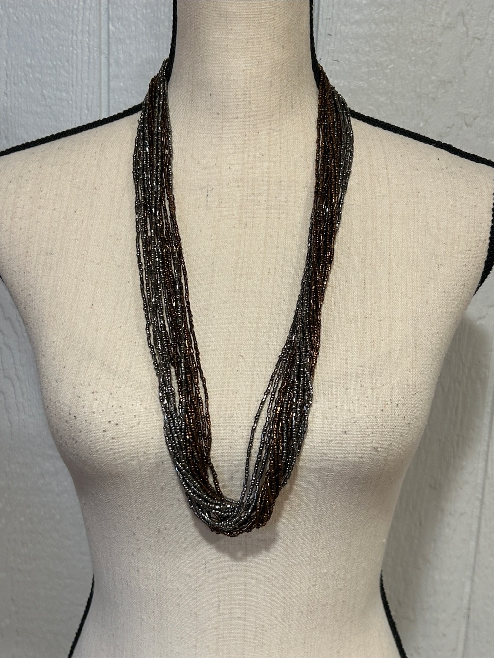 Multi-Strand Brown and Black Beaded Necklace